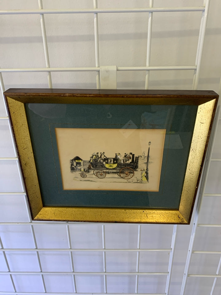 VTG CARRIAGE PRINT IN GOLD FRAME WALL HANGING.