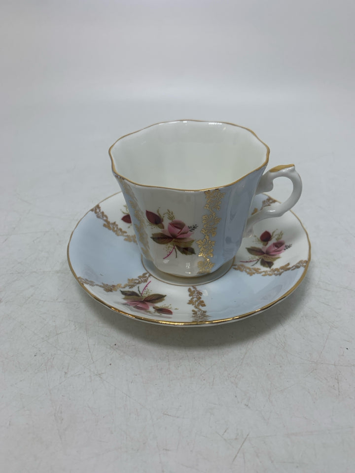 LIGHT BLUE/WHITE STRIPED TEACUP W/ PINK ROSES.