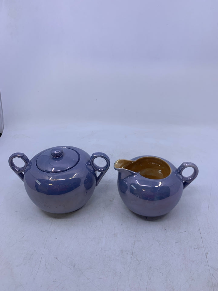 BLUE IRIDESCENT W/ ORANGE INSIDE.