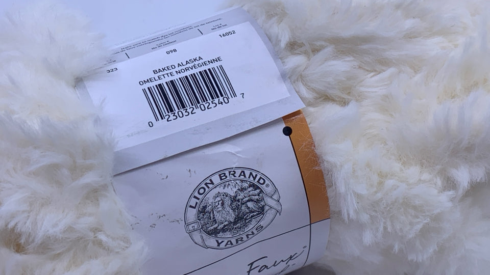FUZZY CREAM YARN.