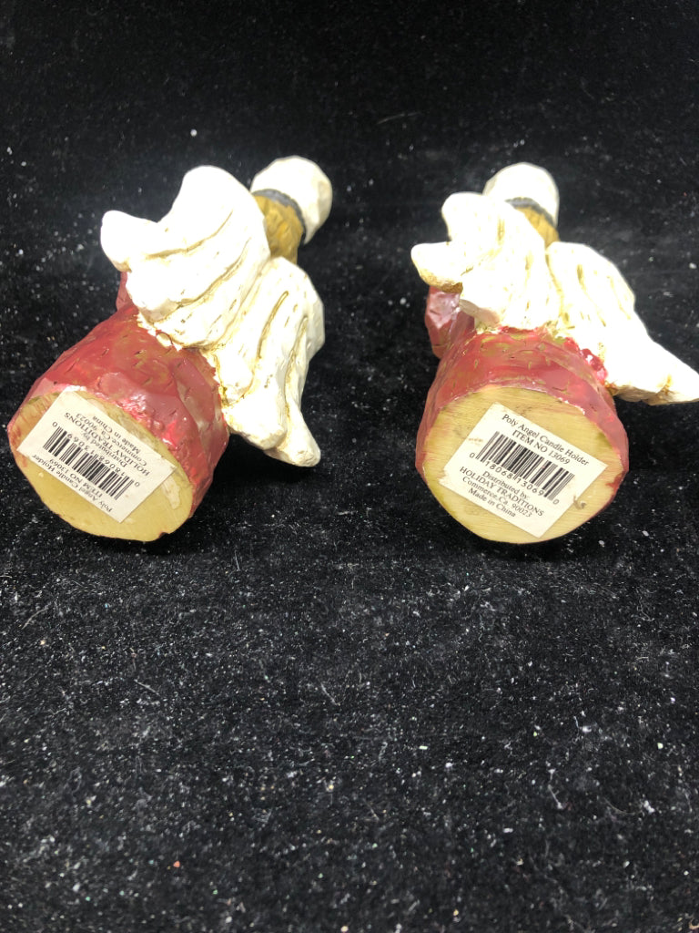 2 RESIN CARVED ANGEL TAPER CANDLE HOLDER.