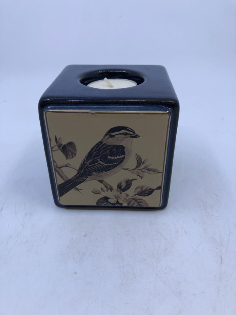 BLUE SQUARE CANDLE HOLDER W/ BIRD PRINT.