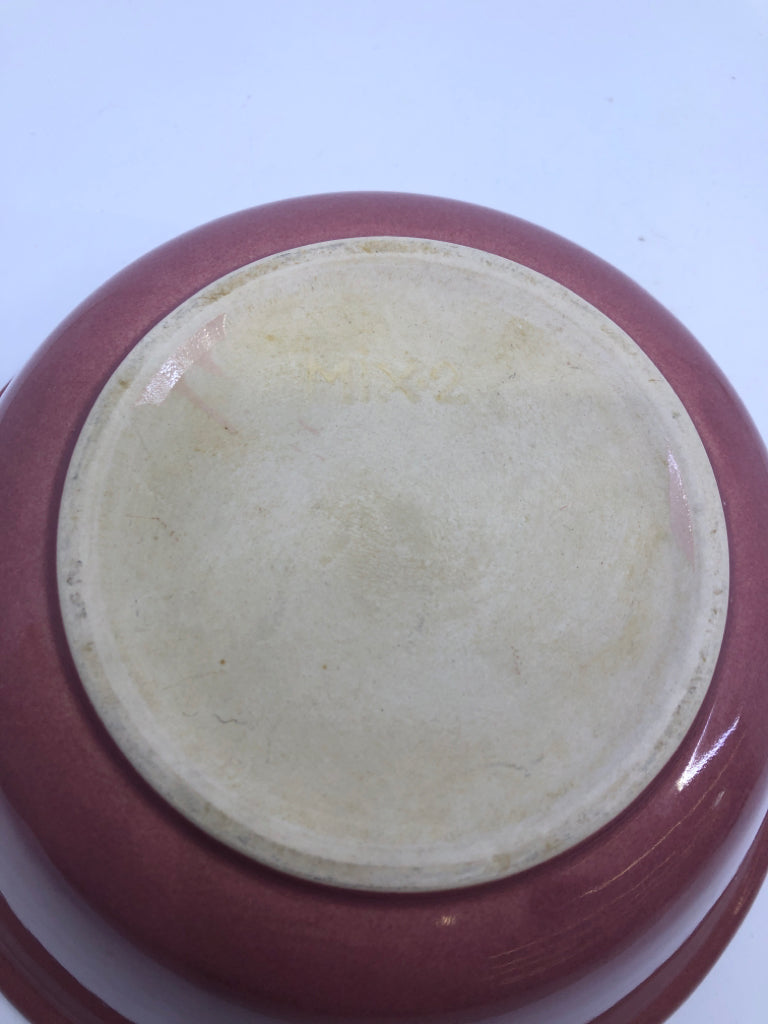 PINK POTTERY SERVING BOWL W/ FLARED EDGE.
