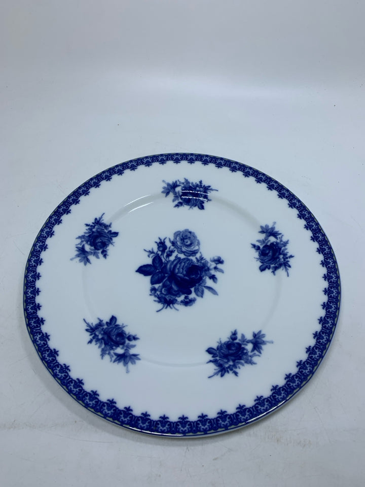 WHITE CIRCLE PLATTER W/ BLUE FLOWERS.