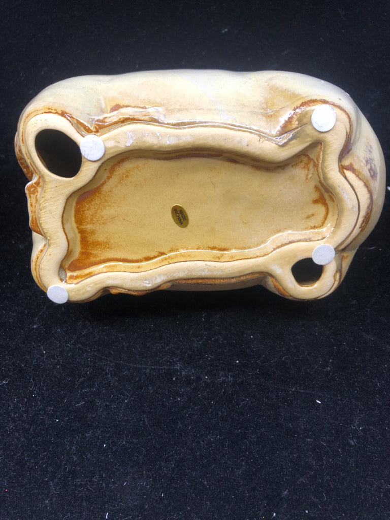 TAN CERAMIC COW.