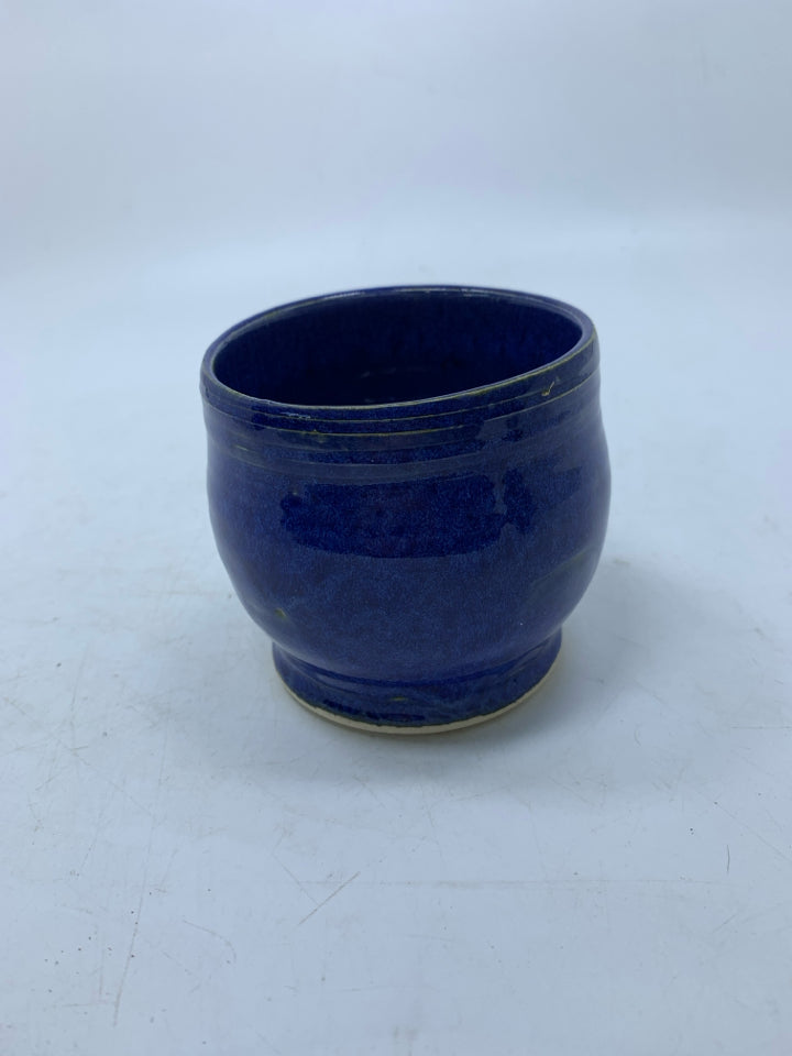 ELECTRIC BLUE SHORT POTTERY VASE.