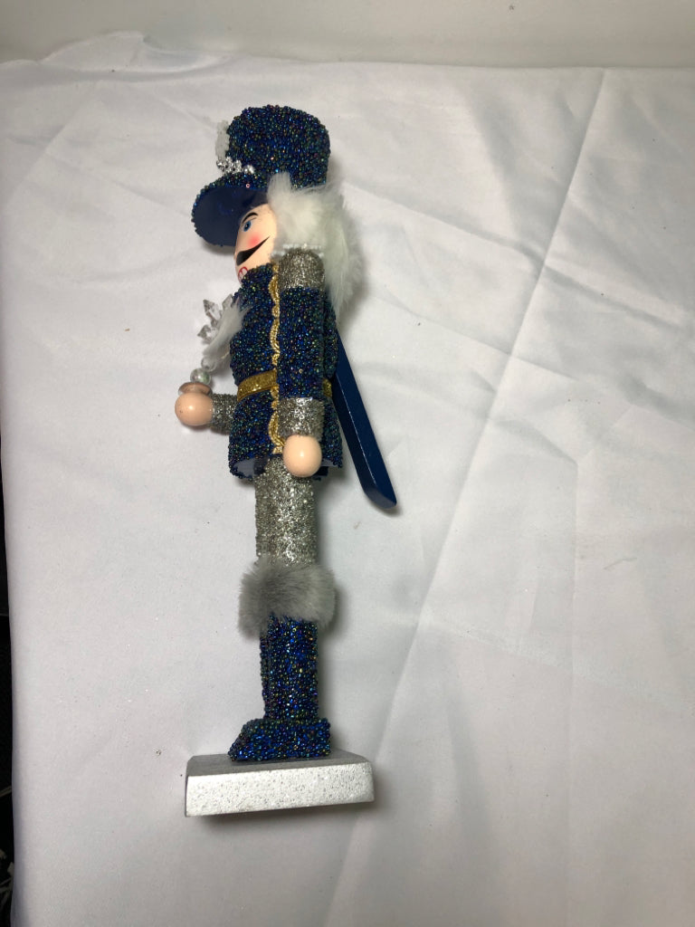 BLUE AND SILVER SNOWFLAKE NUT CRACKER.