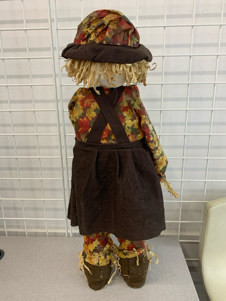 AUTUMN SCARECROW IN BROWN OVERALL DECOR.