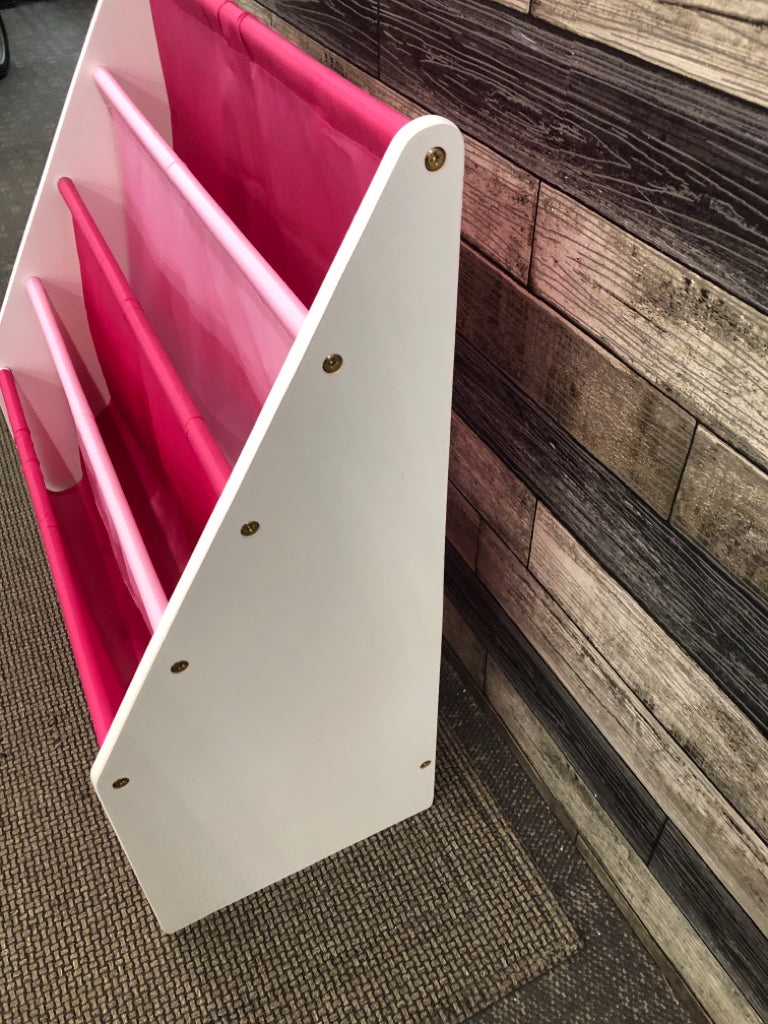 CHILDRENS PINK SLING BOOK RACK.