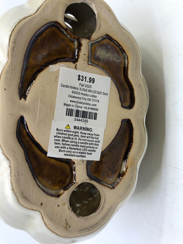 CERAMIC TAN PUMPKIN TEA LIGHT HOLDER.