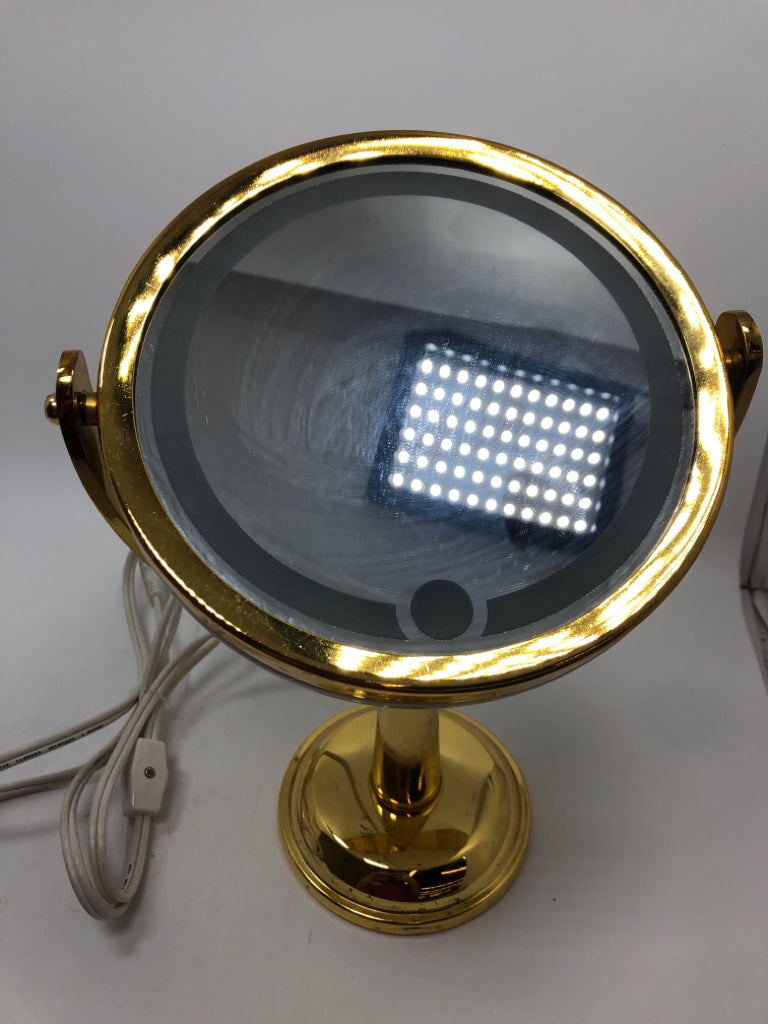 GOLD MAGNIFYING MAKEUP MIRROR.
