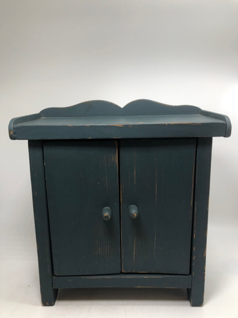 MINI BLUE WOODEN CABINET W/ 2 SHELVES.