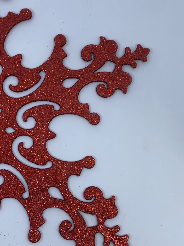 LARGE RED GLITTER SNOWFLAKE ORNAMENT.