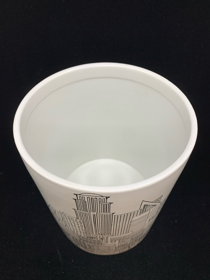 CERAMIC CITY TRASH CAN.
