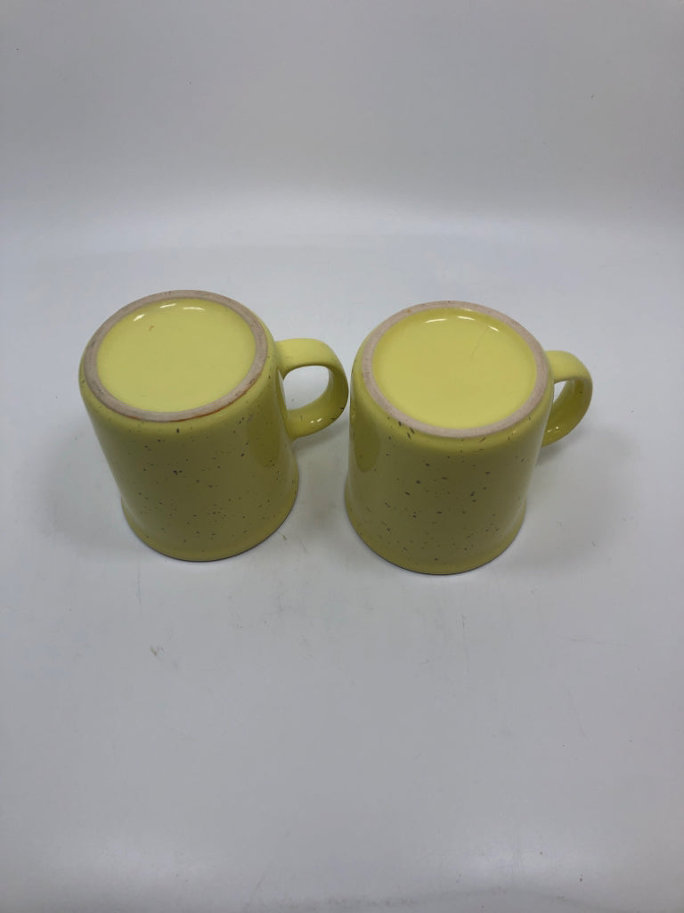 2 YELLOW CERAMIC BUT FIRST COFFEE MUGS.