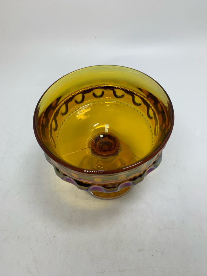 FOOTED AMBER IRIDESCENT GLASS W/ THUMB PRINT.