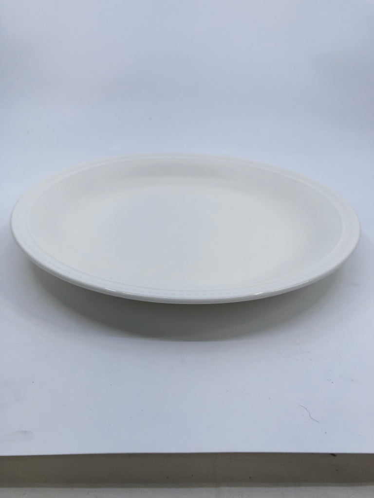 4 WHITE DEEP DINNER PLATES.