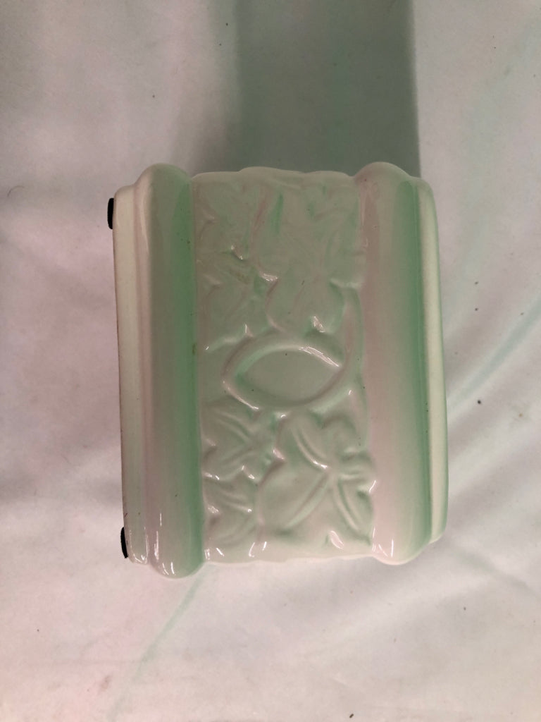WHITE SQUARE CERAMIC PLANTER W/ EMBOSSED FLOWERS.