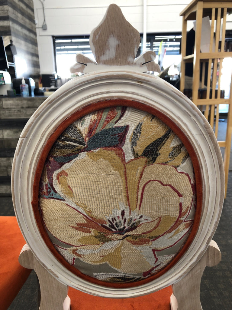 3 BURNT ORANGE UPHOLSTERED WHITE WASHED BAR STOOLS W/ FLORAL DESIGN ON BACK.
