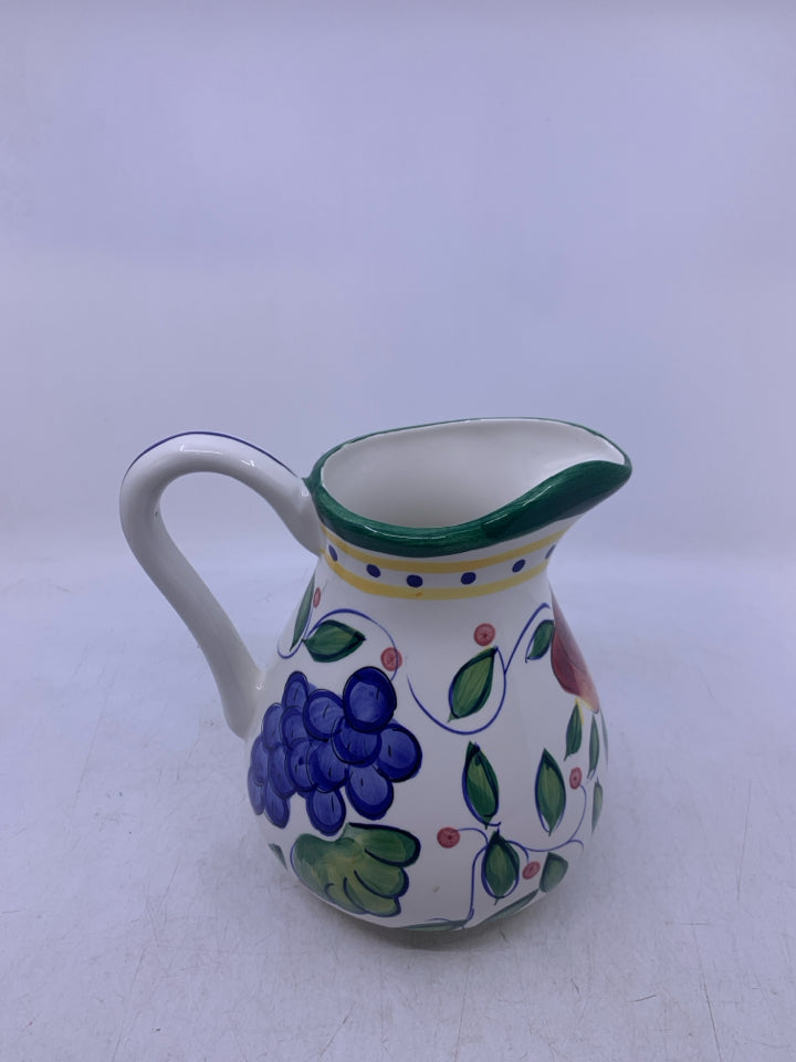 WHITE PITCHER W/ PAINTED FRUIT/FLOWERS.