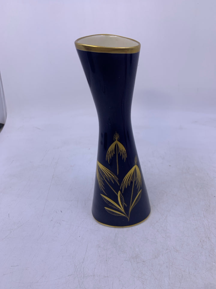 COBALT BLUE TRIANGLE SHAPED VASE W/ LEAF/STEMS FLOWERS.