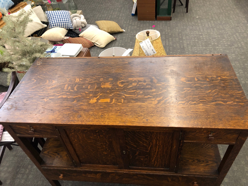 VTG LARGE BUFFET TABLE W 3 DRAWERS AND CABINET ON WHEELS.