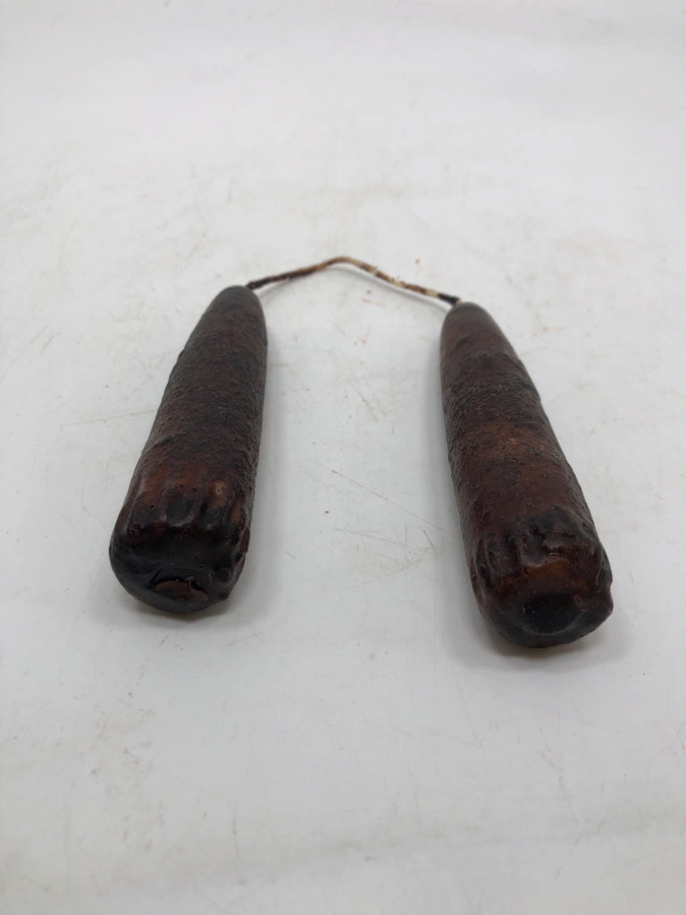 CONNECTED PRIMITIVE CANDLES.