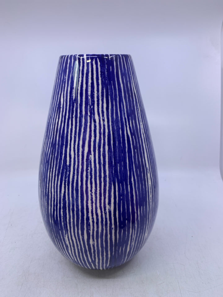 WHITE CERAMIC VASE W/ BLUE STRIPES.