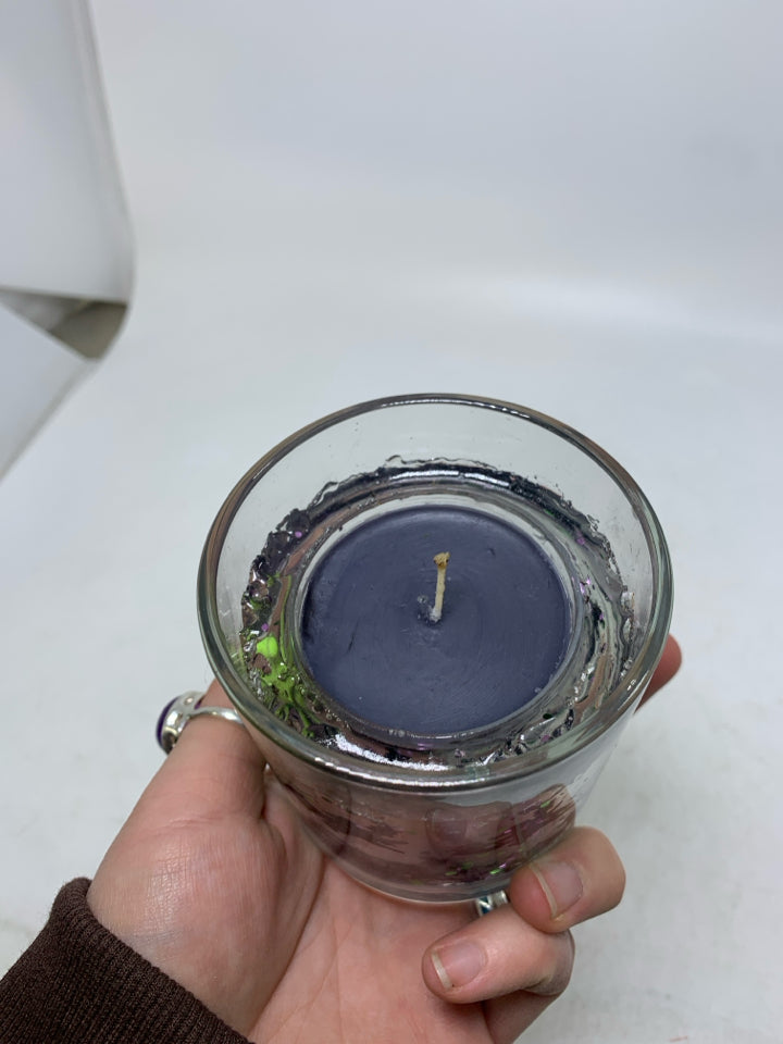 SMALL WITCH THEMED CANDLE.