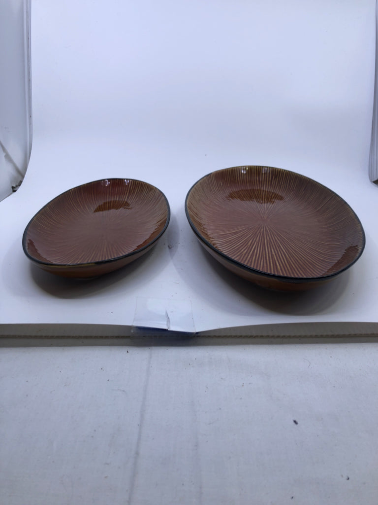 2 BROWN OVAL CERAMIC SERVING PLATES.