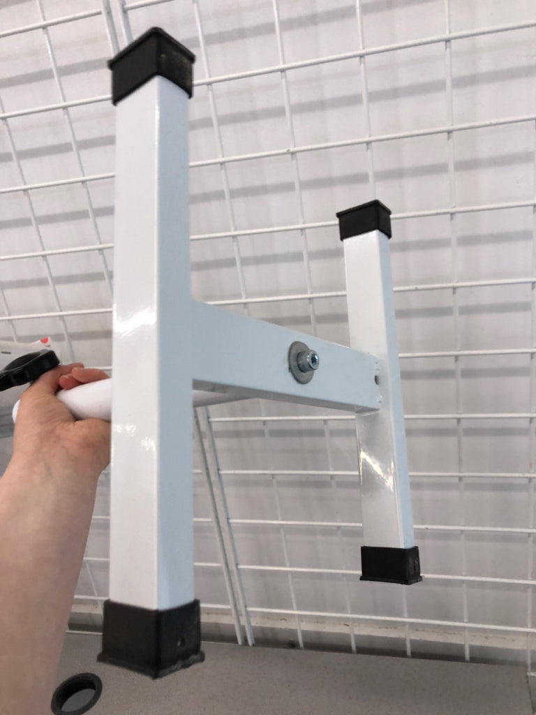 ADJUSTABLE LEG REST STOOL.