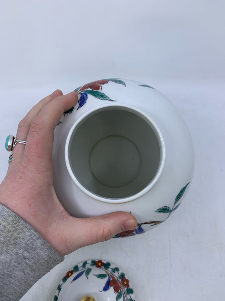 WHITE GINGER JAR W/ RED FLOWERS.