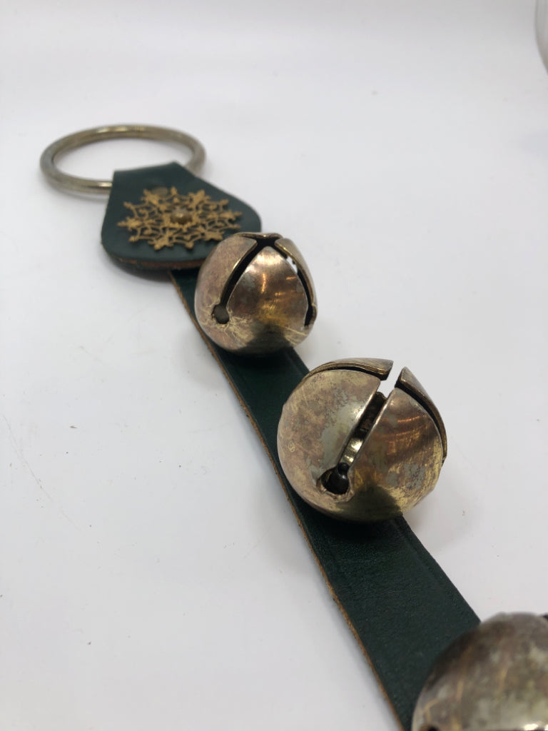 SLEIGH BELLS W/FAUX LEATHER DOOR HANGING DECOR.