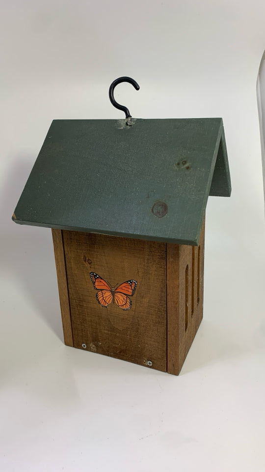 WOOD BIRDHOUSE W/BUTTERFLY DETAILS.
