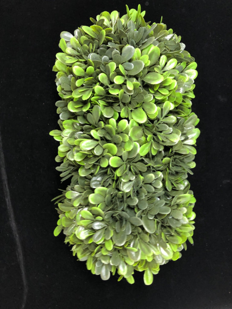 FAUX GREENS IN WHITE CERAMIC PLANTER.
