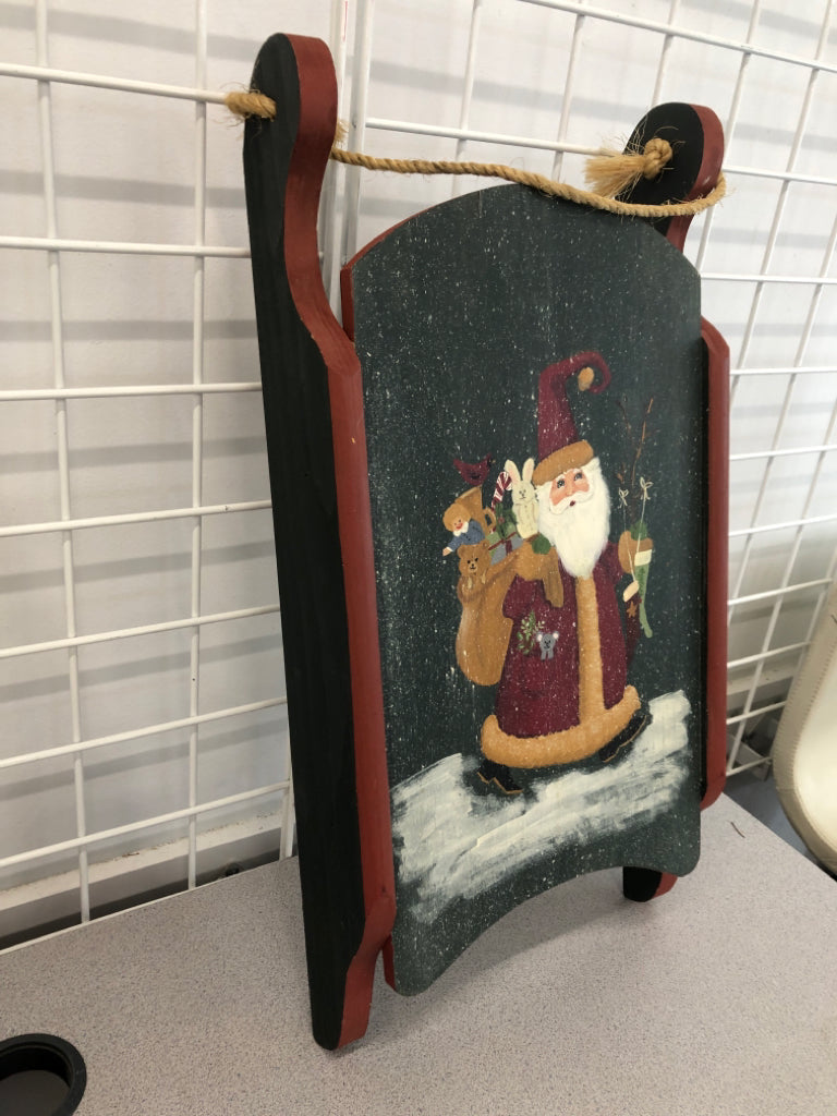 PAINTED VTG SANTA LOOK SLEIGH WALL HANGING.