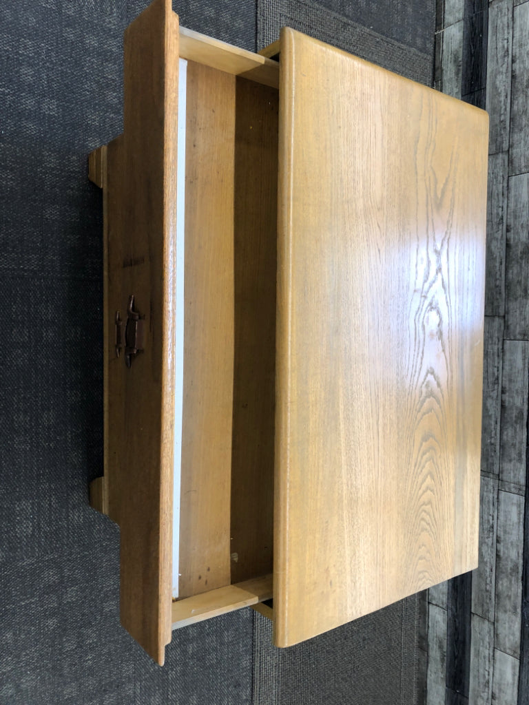 4 DRAWER LIGHT WOOD LOW DRESSER W/BRASS HANDLES.