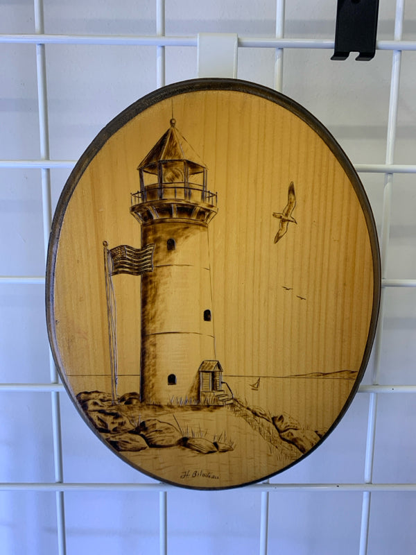 WOOD OVAL LIGHT HOUSE WALL HANGING.