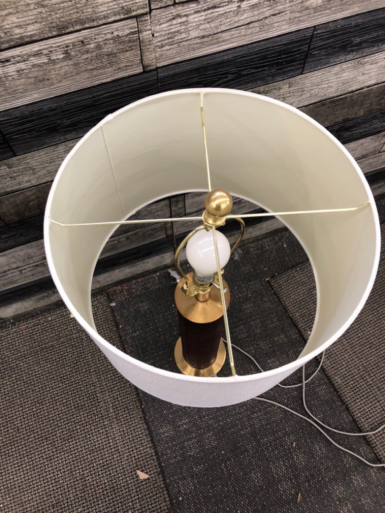 FAUX LEATHER GOLD BASE LAMP W/TAN SHADE.