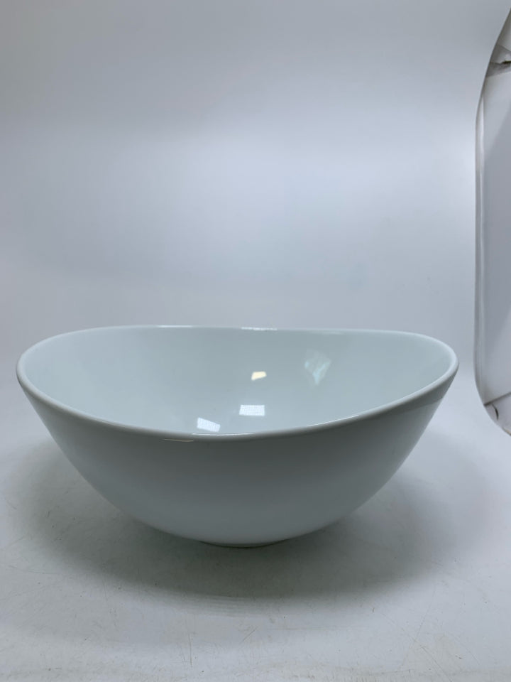 FOOTED OVAL SLANTED SIDES SERVING BOWL.