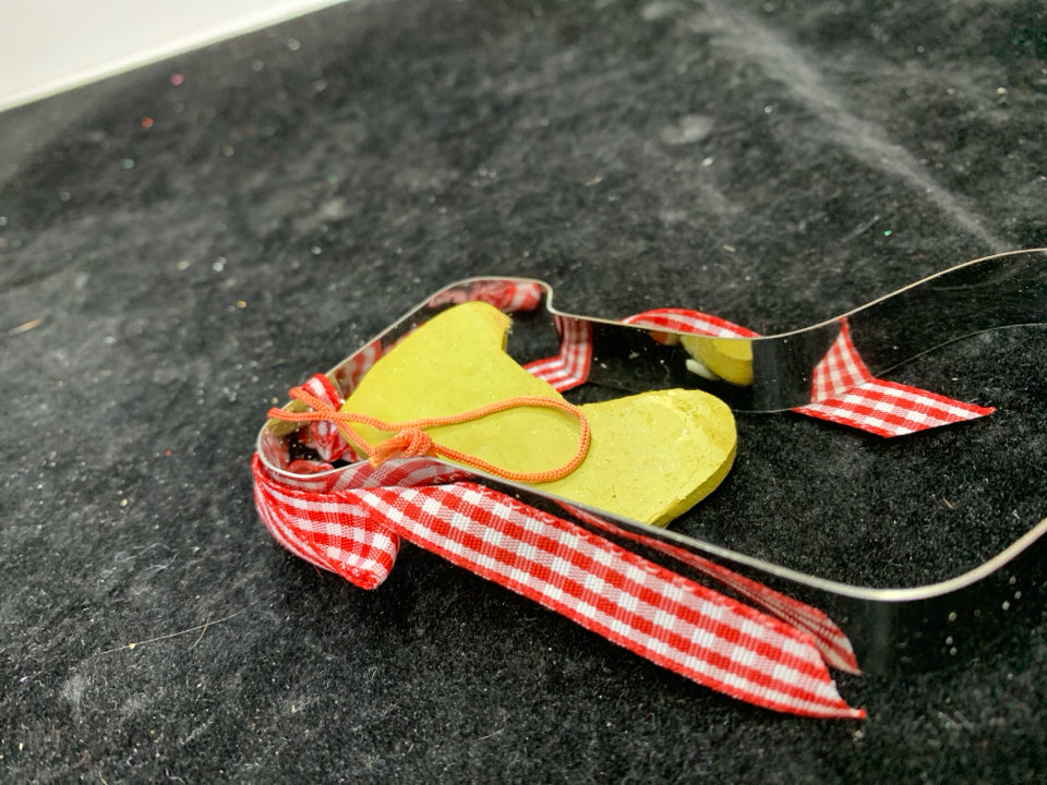 SILVER METAL STOCKING COOKIE CUTTER ORNAMENT.