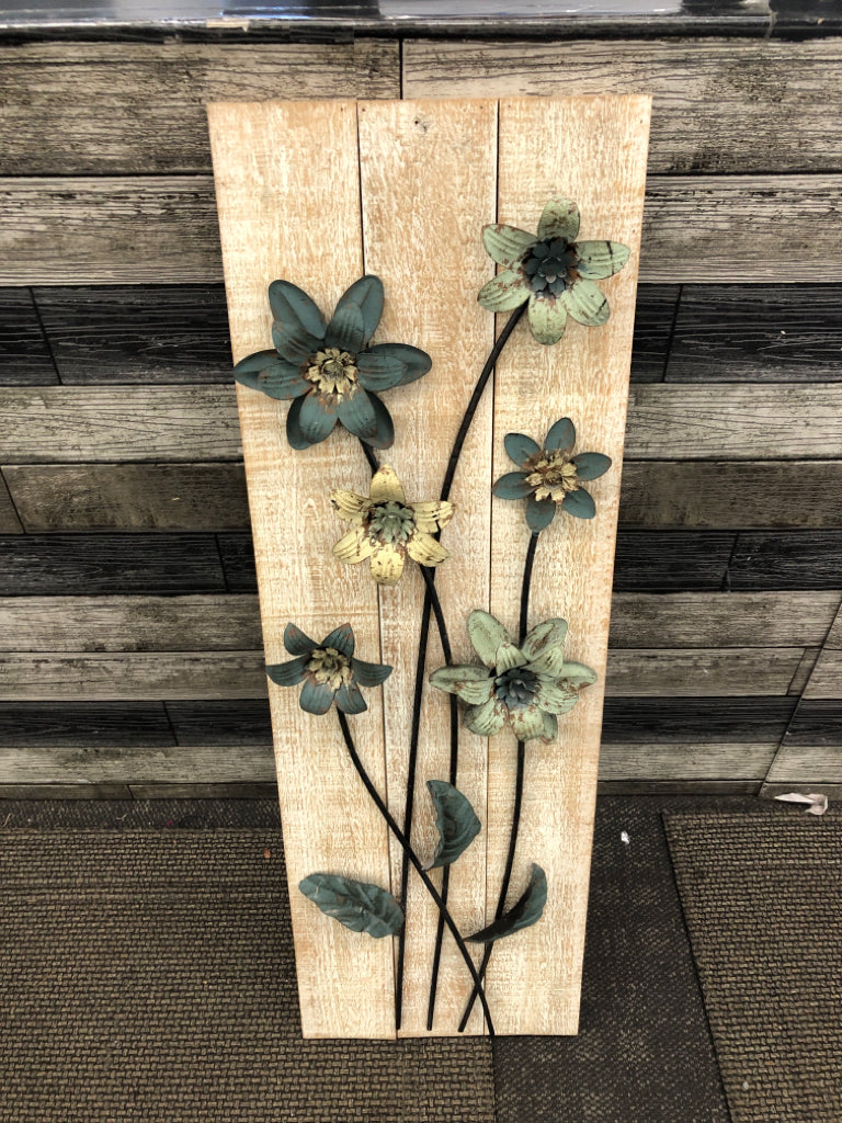 BLUE METAL FLOWERS ON WOOD WALL DECOR.