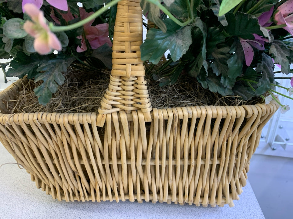 FAUX PINK FLORAL IN BASKET.