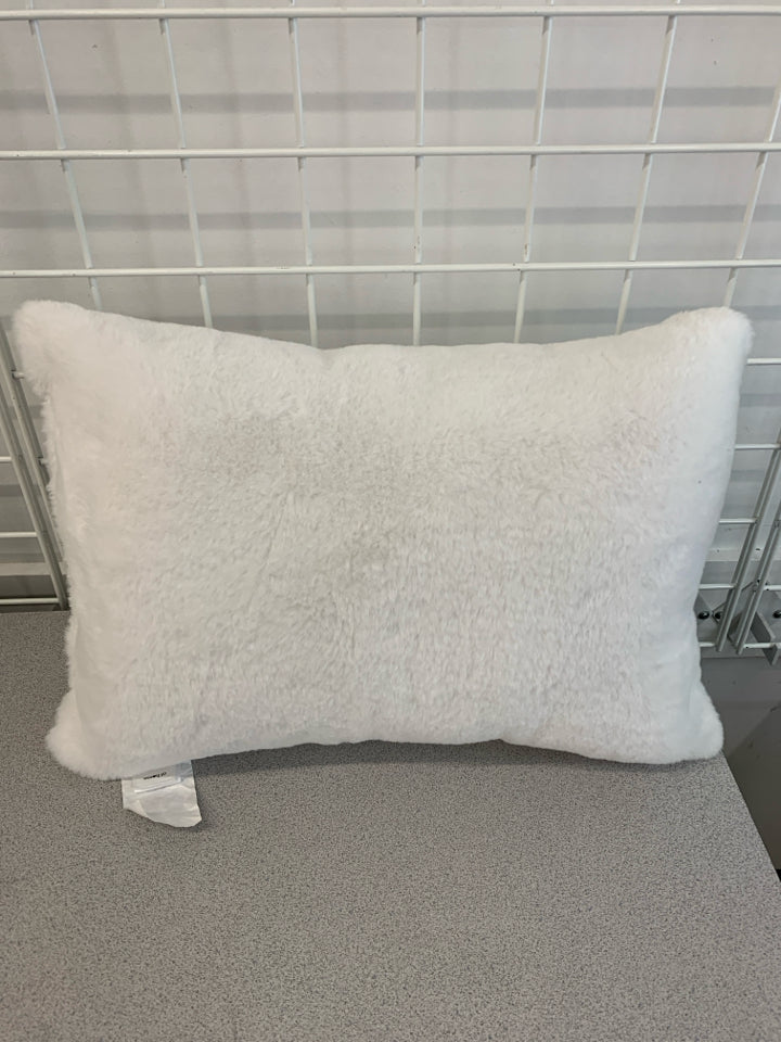 WHITE RECTANGLE FUZZY PILLOW.