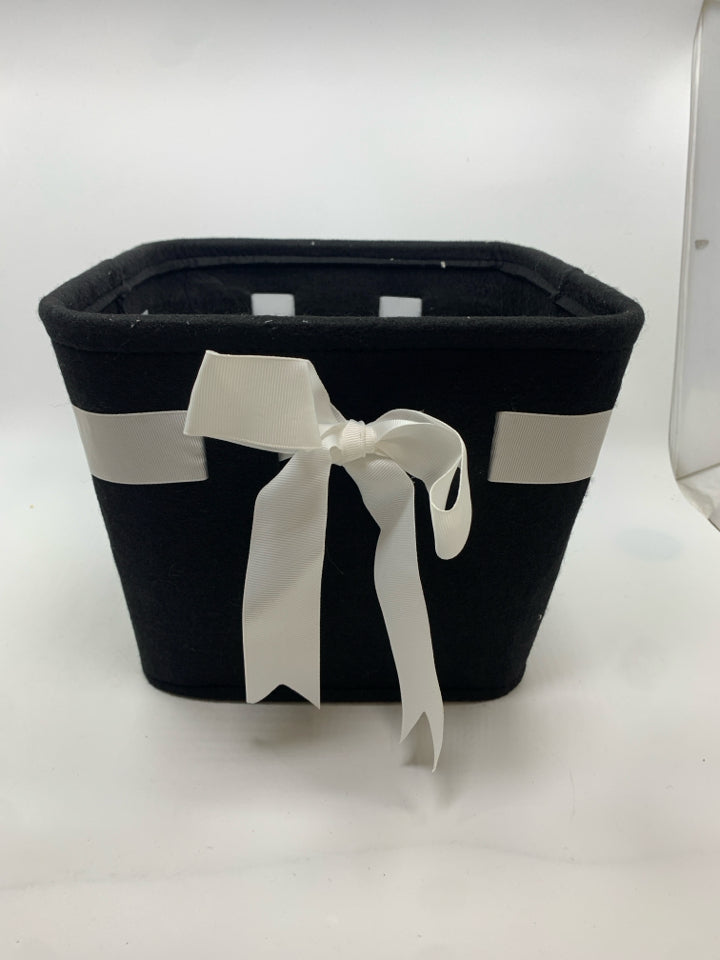 BLACK AND WHITE FELT BASKET WITH BOW.