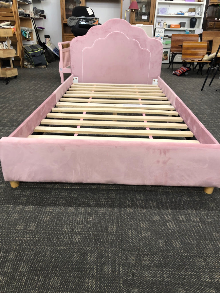 UPHOLSTERED PINK VELVET TWIN BED W/CLOUD-SHAPED HEADBOARD.