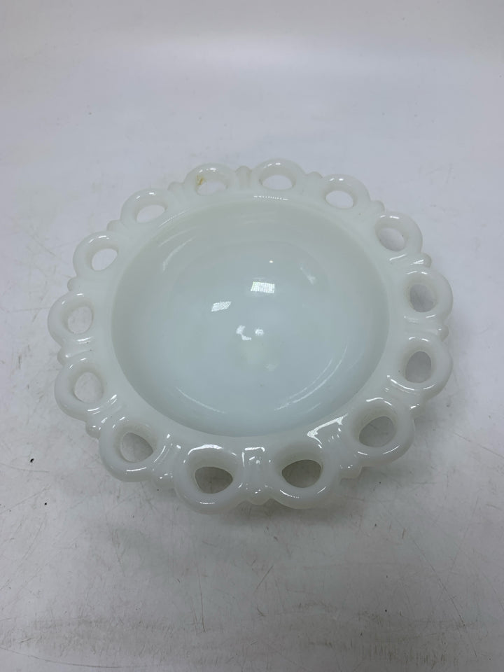 FOOTED MILK GLASS CANDY DISH W/ PIERCED EDGE.