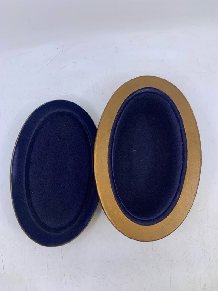 OVAL HEAVY BRONZE/GOLD EMBOSSED SCROLL COVERED TRINKET BOX.