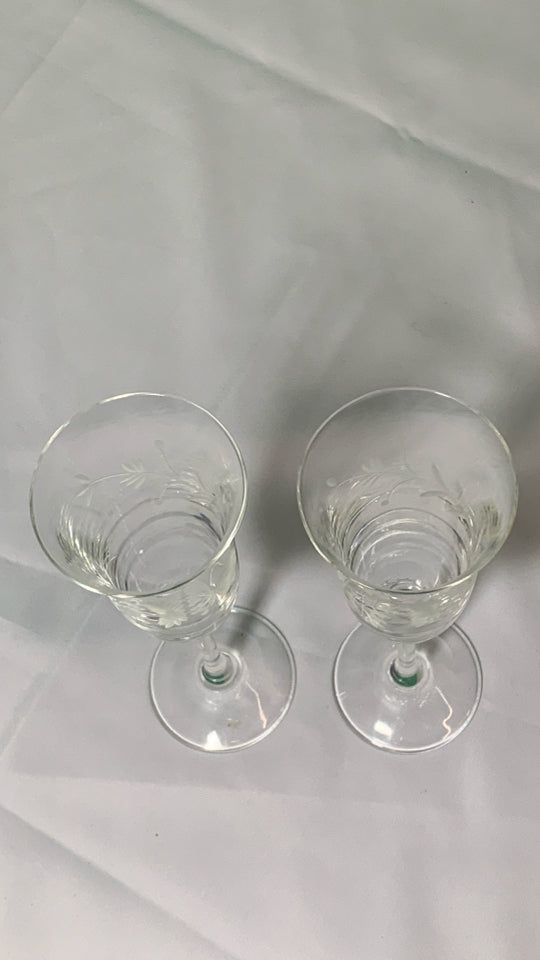 2 FLORAL ETCHED CHAMPAGNE FLUTES.