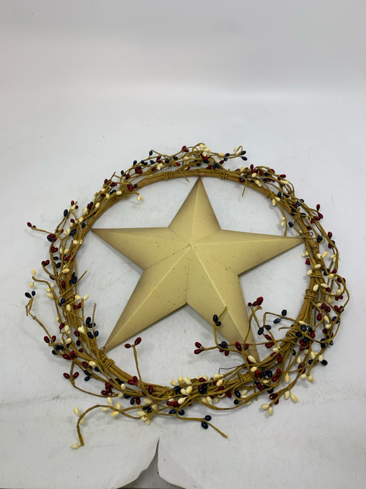 METAL STAR W/ RED WHITE BLUE PIPE BERRIES.